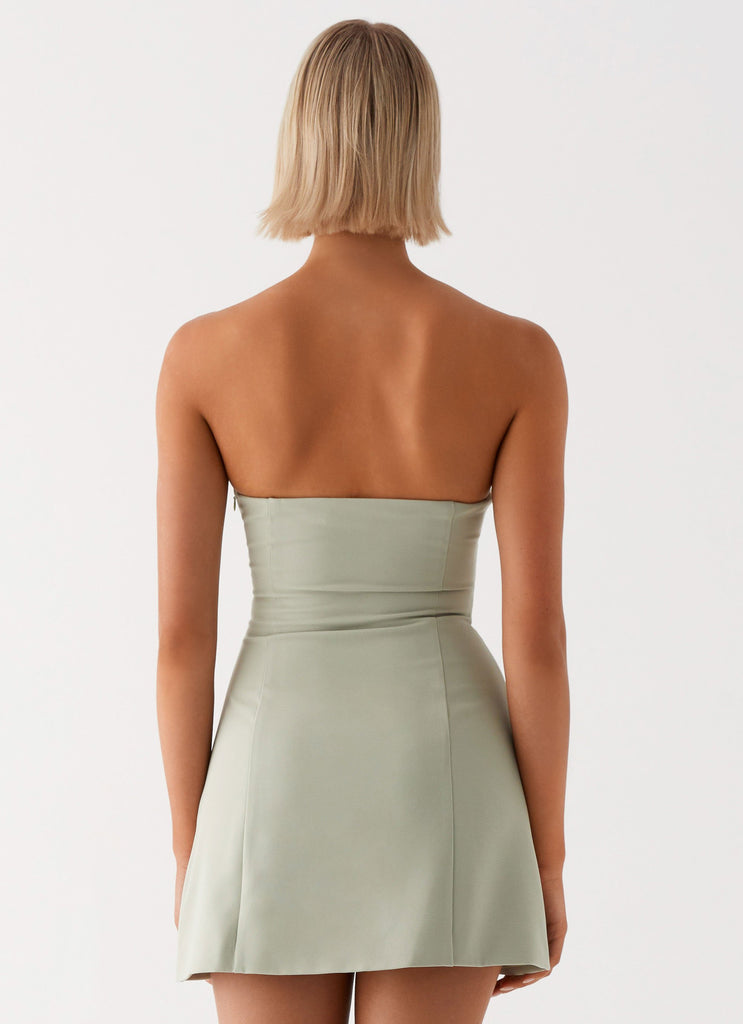 Womens Roxie Mini Dress in the colour Khaki in front of a light grey background