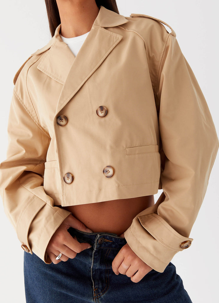 Womens Teddie Cropped Trench Coat in the colour Camel in front of a light grey background