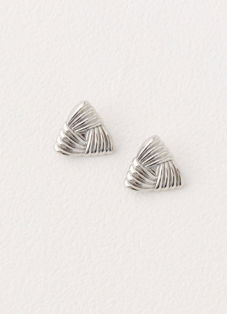 Womens Unholy Earrings in the colour Sillver in front of a light grey background