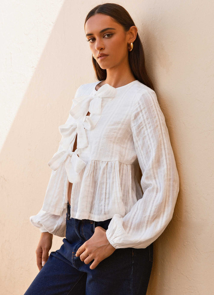 Womens Western Wind Long Sleeve Top in the colour White in front of a light grey background