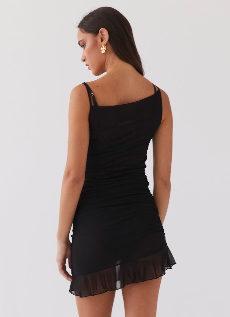 Womens Pass The Prosecco Mini Dress in the colour Black in front of a light grey background