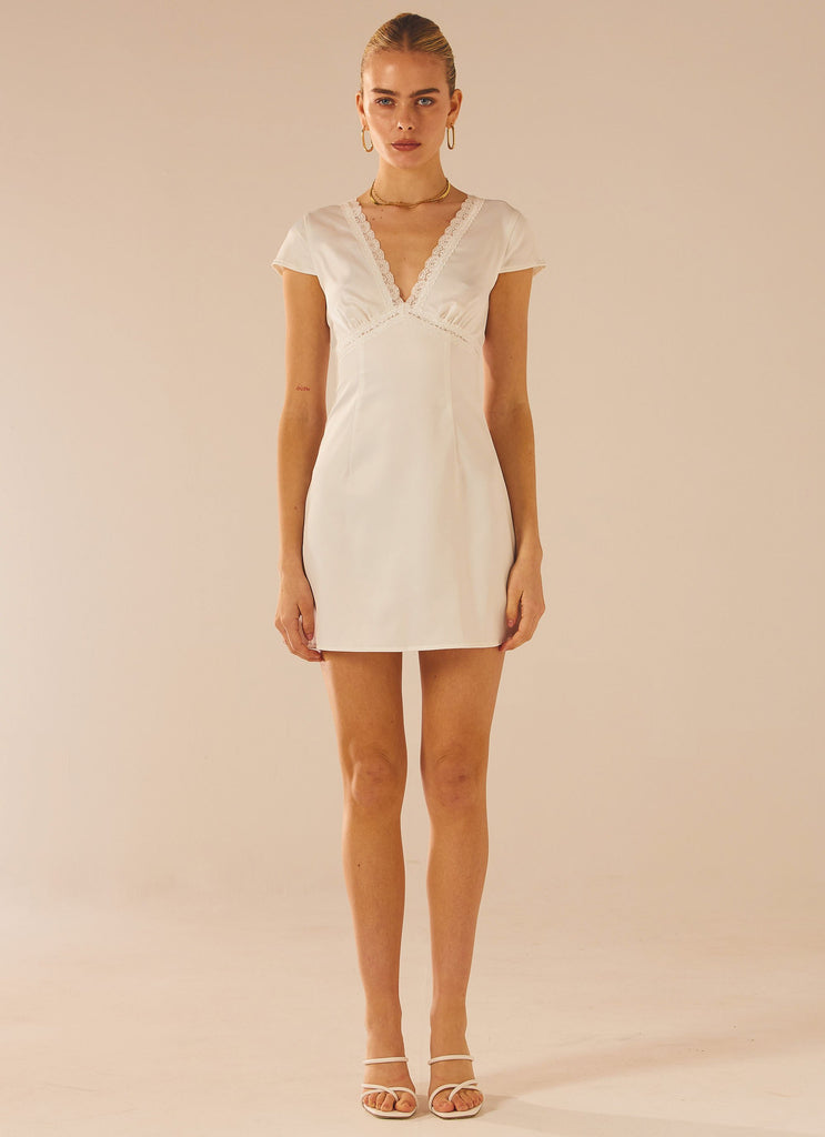 Womens French Oasis Mini Dress in the colour White Rose in front of a light grey background