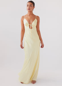 Womens Flora Satin Maxi Dress in the colour Lemon in front of a light grey background