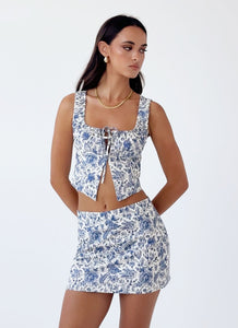 Womens Take Me Away Mini Skirt in the colour Blue Paisley in front of a light grey background