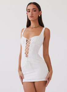 Womens Casey Lace Up Mini Dress in the colour White in front of a light grey background