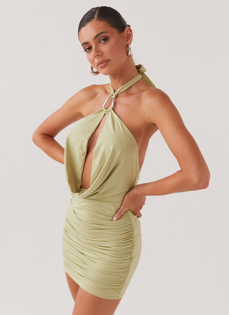 Womens Samara Halterneck Mini Dress in the colour Sage in front of a light grey background