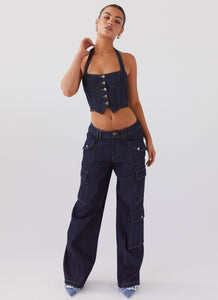 Womens Greedy Denim Cargo Pants in the colour Indigo in front of a light grey background