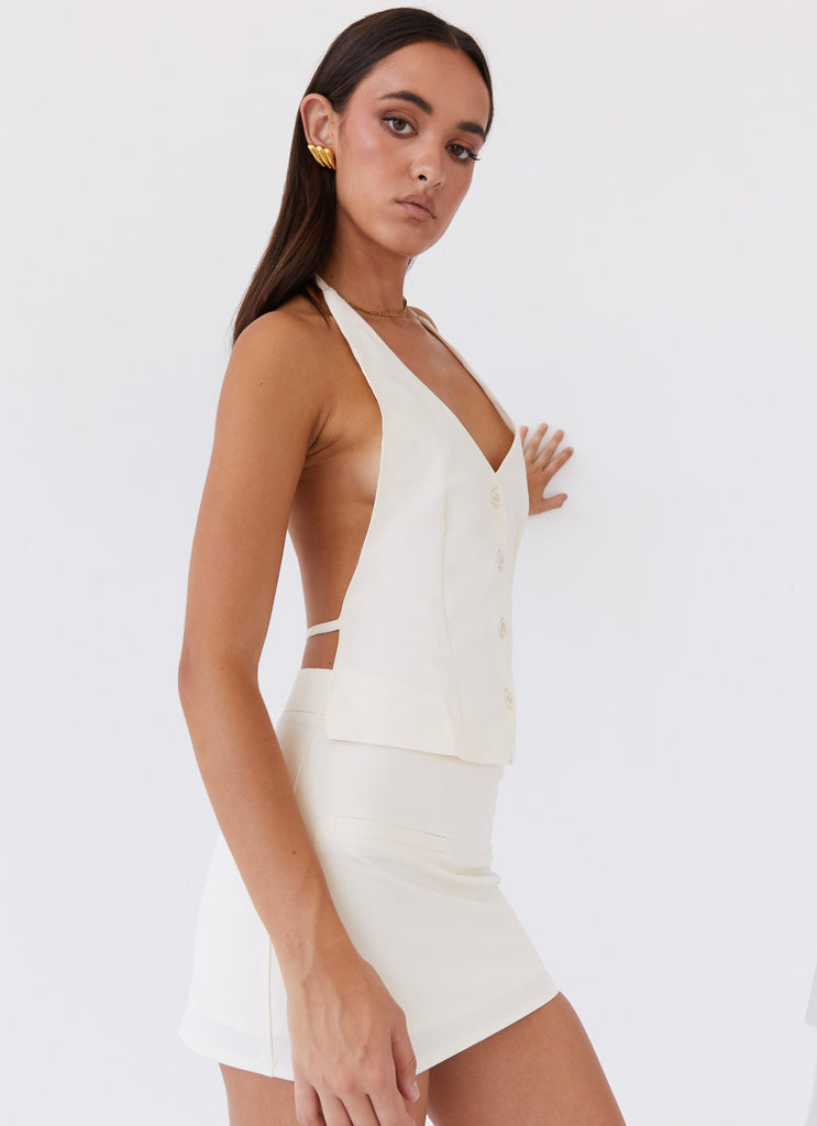 Womens Sarah Halterneck Vest Top in the colour Ivory in front of a light grey background