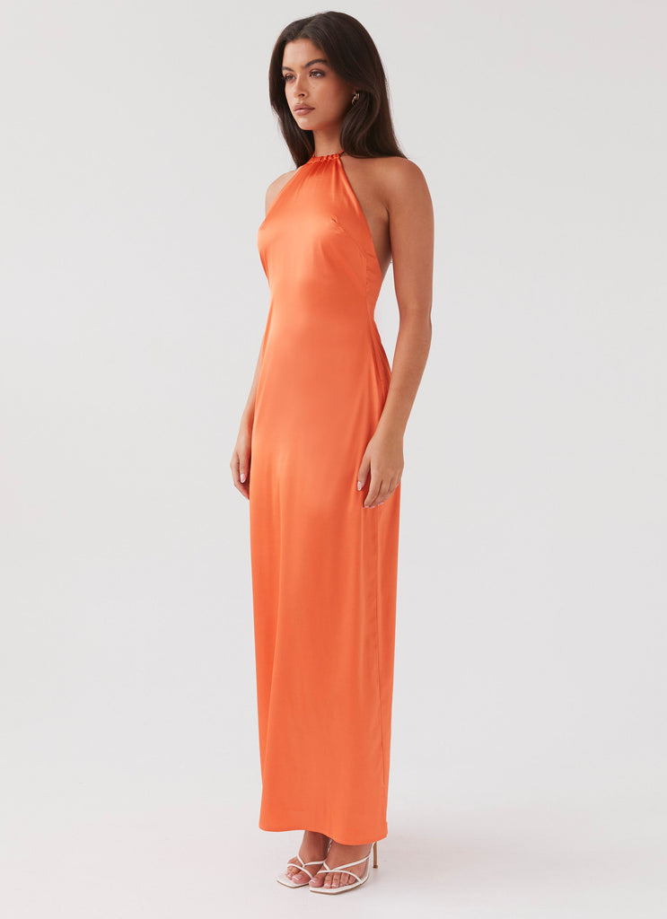 Womens Melody Day Halterneck Maxi Dress in the colour Tangerine in front of a light grey background