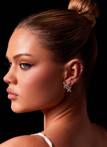 Womens Bold Move Diamante Earrings in the colour Gold in front of a light grey background