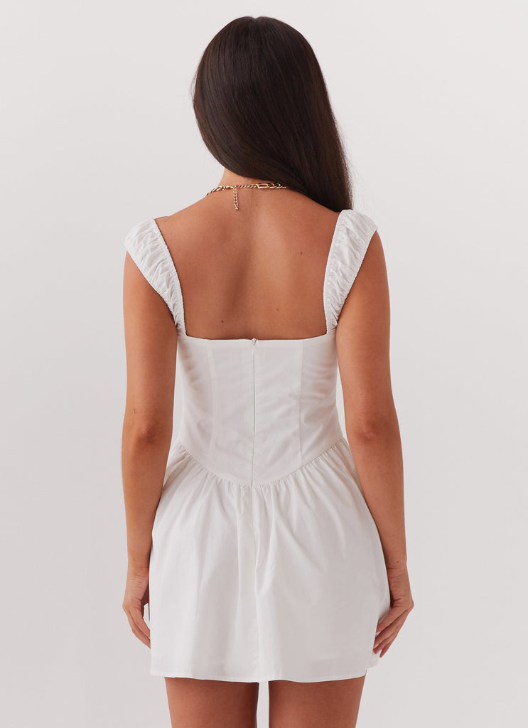 Womens Rebel Heart Corset Dress in the colour White in front of a light grey background