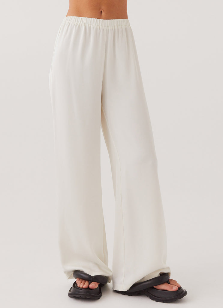 Womens Palm Cove Satin Pants in the colour Pearl Dove in front of a light grey background