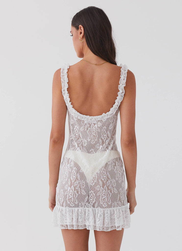 Womens Love Lies Lace Mini Dress in the colour Snow in front of a light grey background