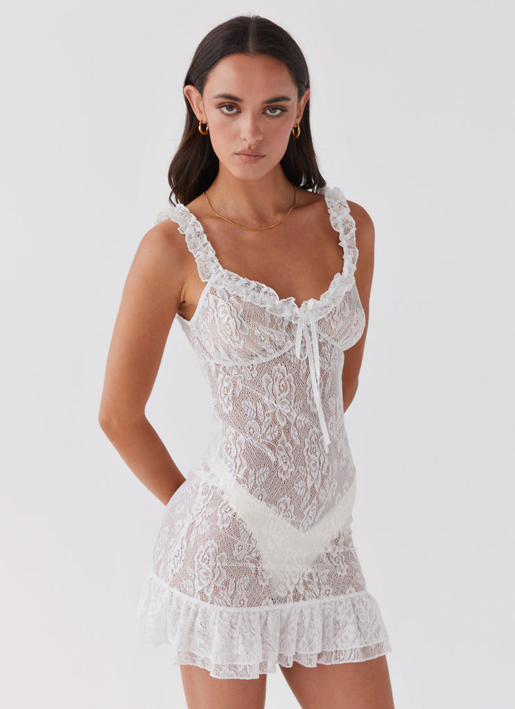 Womens Love Lies Lace Mini Dress in the colour Snow in front of a light grey background