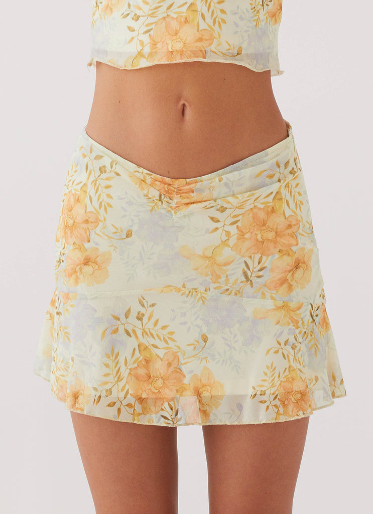 Womens Sun Will Shine Mini Skirt in the colour Dandelion in front of a light grey background