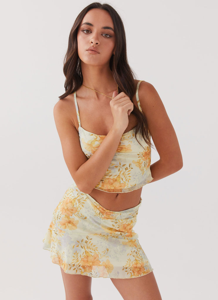 Womens Sun Will Shine Mini Skirt in the colour Dandelion in front of a light grey background