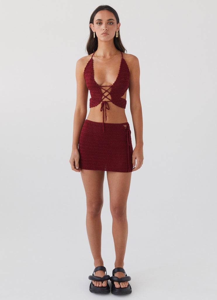 Womens Wild Hearts Crochet Mini Skirt in the colour Cherry Rose in front of a light grey background